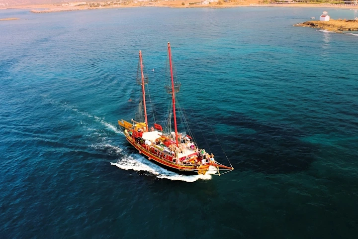 From Hersonissos: Sunset cruise at St. George Bay